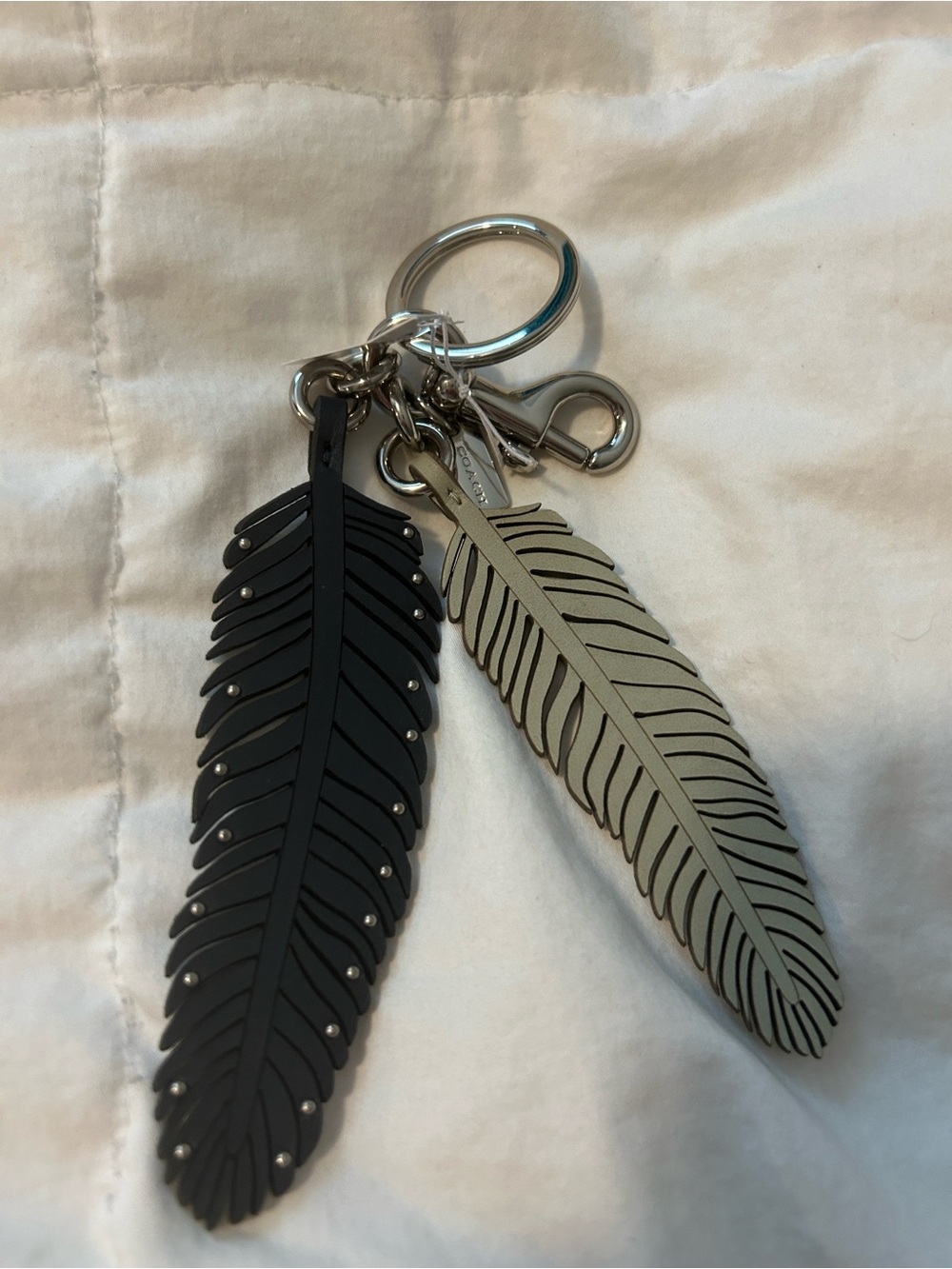Coach Black and Light Gray Feather Keychain